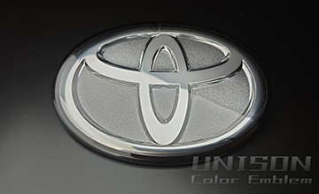 50 RAV4　GRエンブレム(Tマークエンブレム)サンドメタル